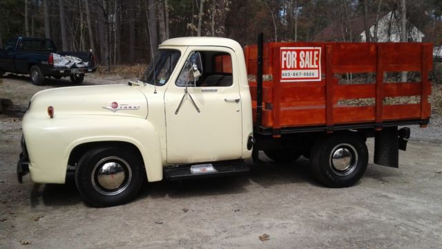 1954 cream Ford F-250 stake bed