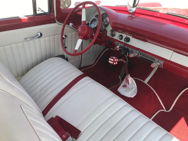 1956 Red Ford Fairlane Coupe