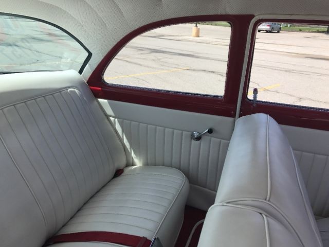 1956 Red Ford Fairlane Coupe