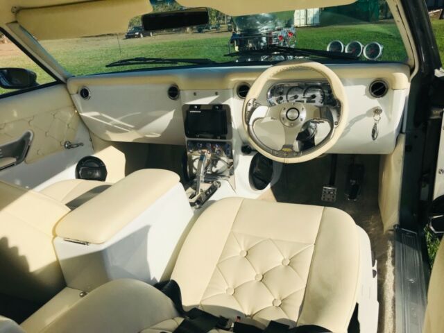 1977 Silver Ford Falcon Coupe