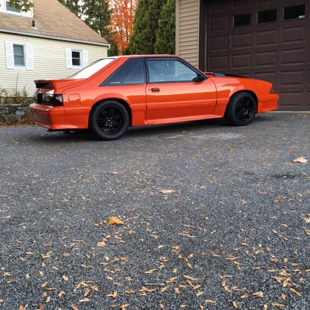 1989 Orange metallic Ford Mustang Hatchback