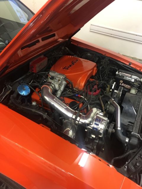 1989 Orange metallic Ford Mustang Hatchback