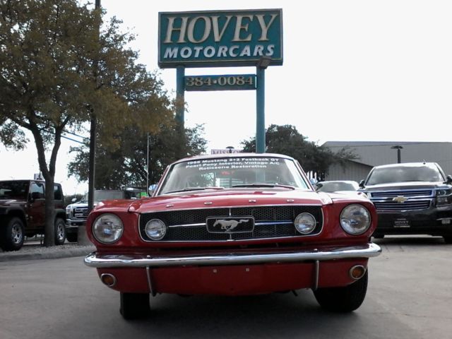 1965 Red Ford Fast Back Coupe