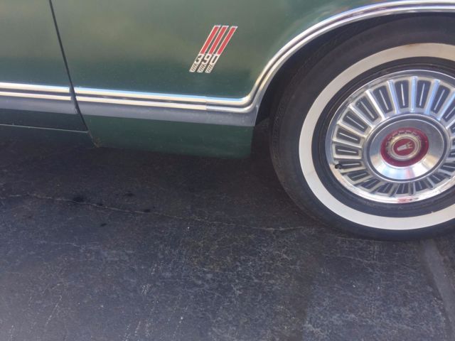 1967 green Ford Galaxie Convertible