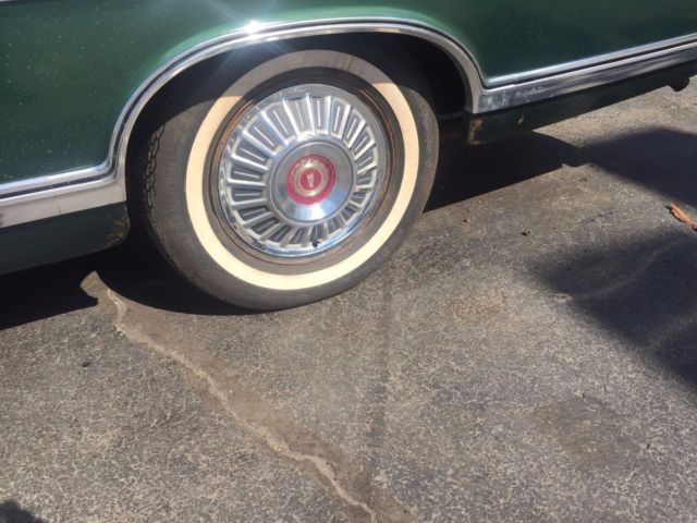 1967 green Ford Galaxie Convertible