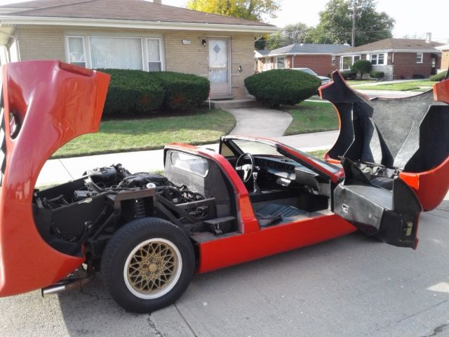 1969 Ferrari red Ford Ford GT 2 seat roadster