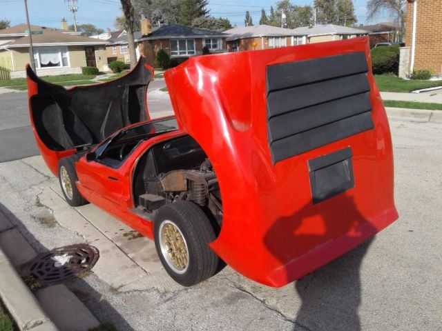 1969 Ferrari red Ford Ford GT 2 seat roadster