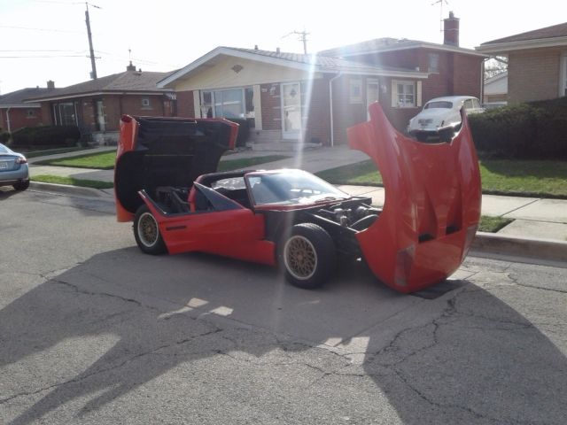 1969 Ferrari red Ford Ford GT 2 seat roadster