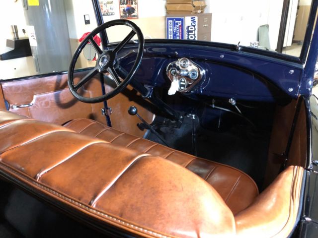 1929 Burgundy Ford Pheaton Convertible