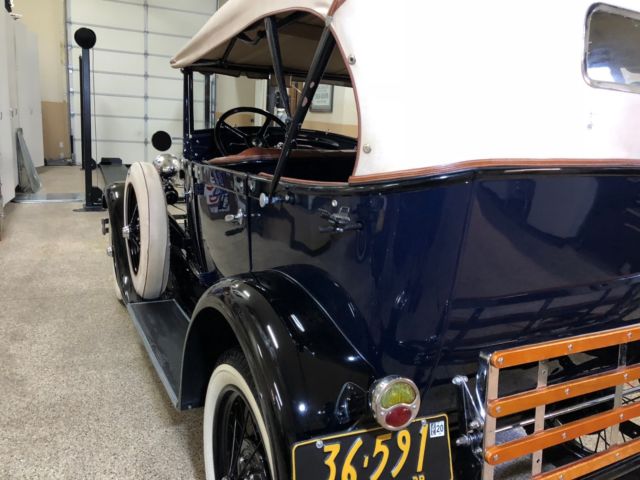 1929 Burgundy Ford Pheaton Convertible