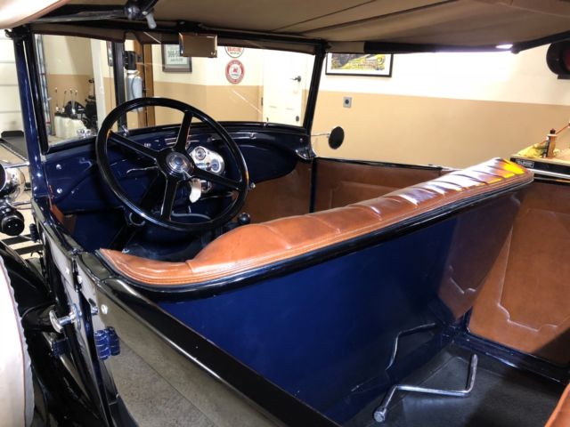 1929 Burgundy Ford Pheaton Convertible
