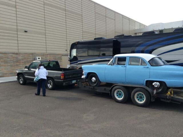 1955 Blue white Ford Mainline 4 dr