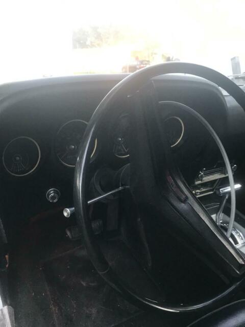 1969 grey metallic Ford Mustang Convertible