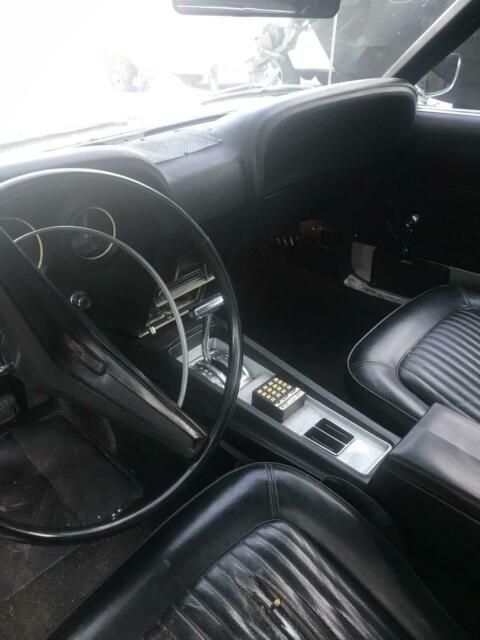 1969 grey metallic Ford Mustang Convertible