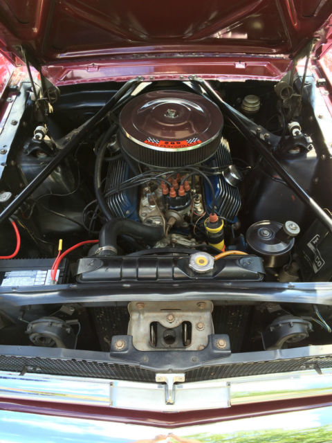 1965 Burgundy Ford Mustang Convertible