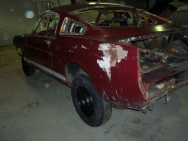 1965 Burgundy Ford Mustang Fastback