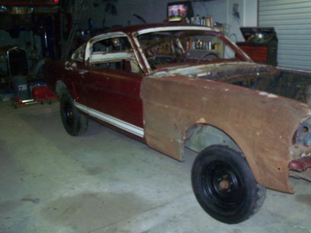 1965 Burgundy Ford Mustang Fastback
