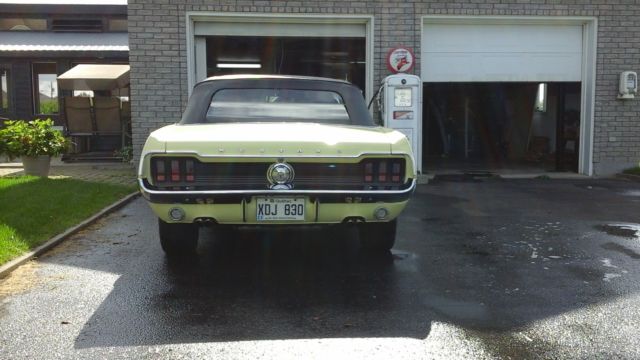 1967 yellow Ford Mustang Convertible