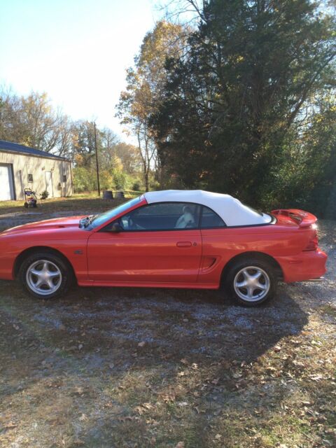 1994 red Ford Mustang Convertible