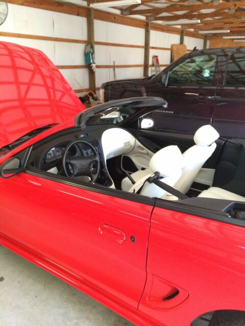 1994 red Ford Mustang Convertible