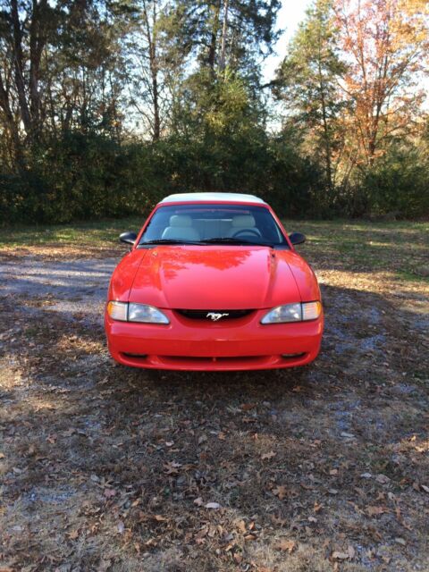 1994 red Ford Mustang Convertible