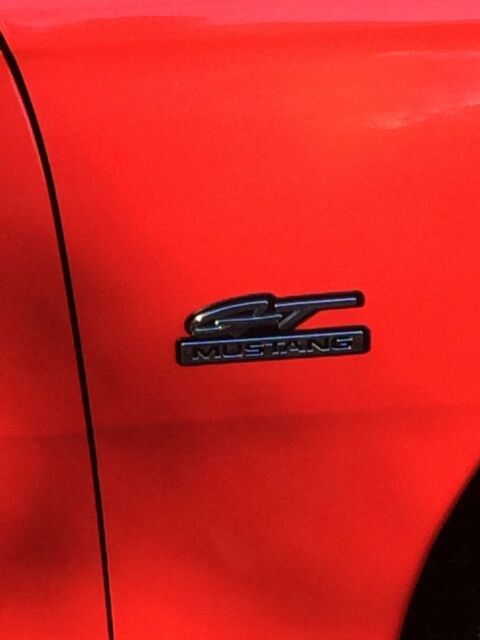 1994 red Ford Mustang Convertible