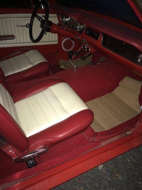 1965 Red Ford Mustang coupe