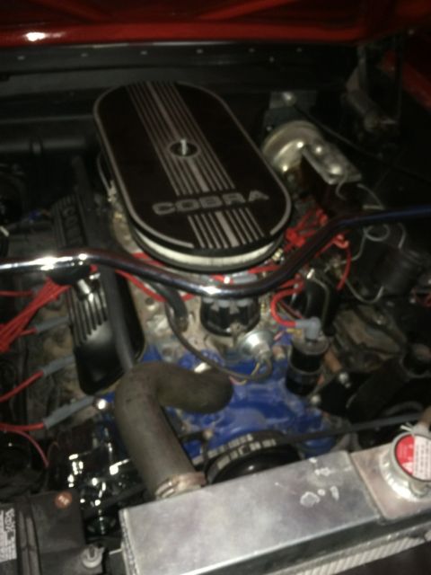 1965 Red Ford Mustang coupe