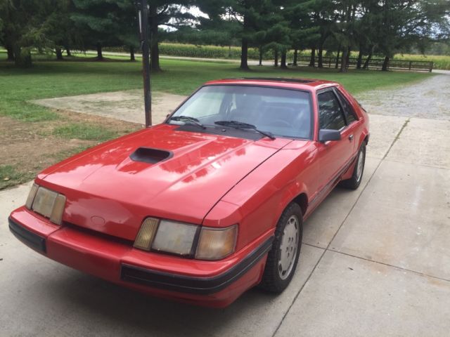 1985 Red Ford Mustang Hatchback