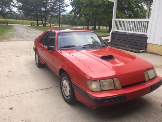 1985 Red Ford Mustang Hatchback