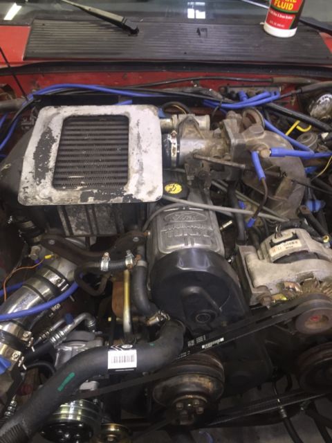 1985 Red Ford Mustang Hatchback