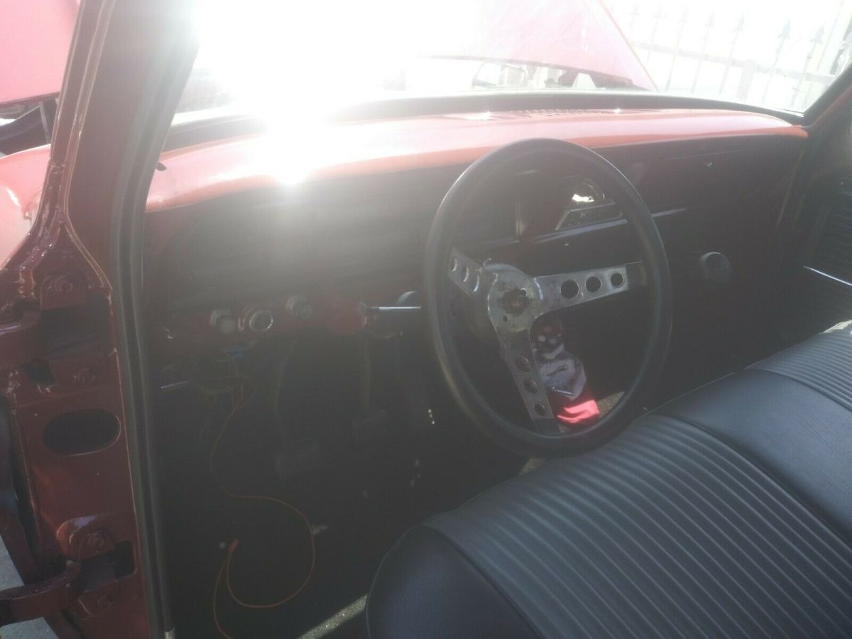 1969 Burgundy Ford F-100 Standard Cab Pickup