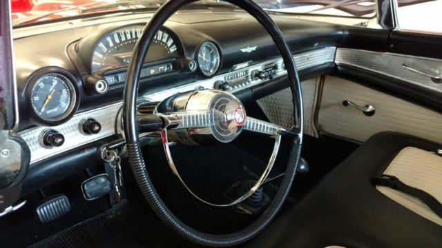 1955 Red Ford Thunderbird Convertible