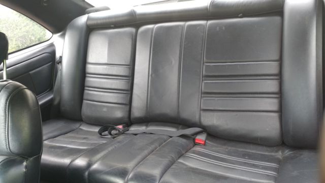 1990 White Ford Thunderbird Coupe