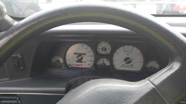 1990 White Ford Thunderbird Coupe