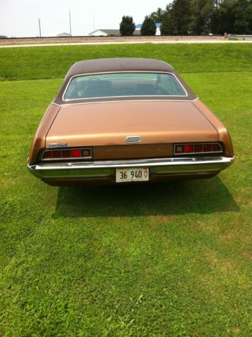 1971 cinnamon Ford Torino Coupe