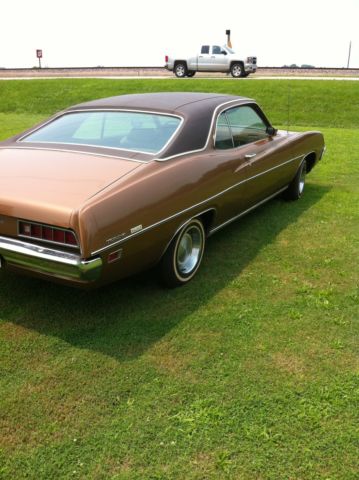 1971 cinnamon Ford Torino Coupe