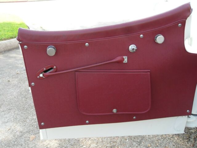 1955 White Jaguar XK Convertible