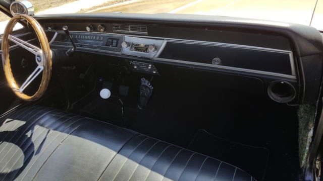 1966 black and gold Chevrolet El Camino