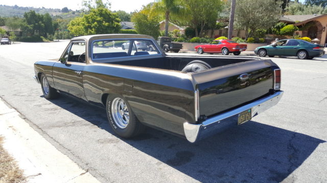 1966 black and gold Chevrolet El Camino
