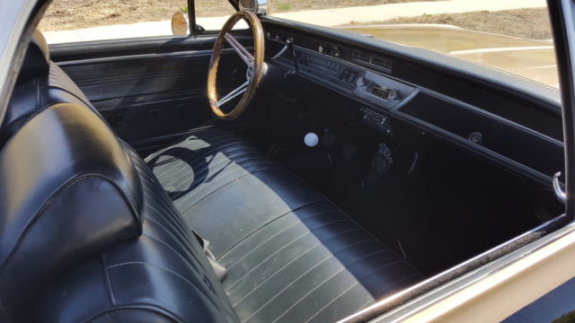 1966 black and gold Chevrolet El Camino