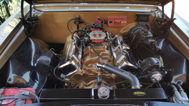 1966 black and gold Chevrolet El Camino