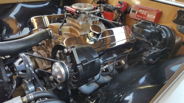 1966 black and gold Chevrolet El Camino