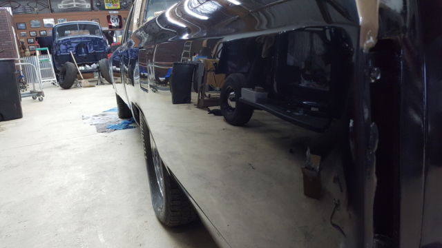 1966 black and gold Chevrolet El Camino