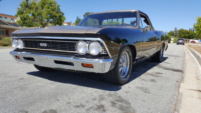 1966 black and gold Chevrolet El Camino