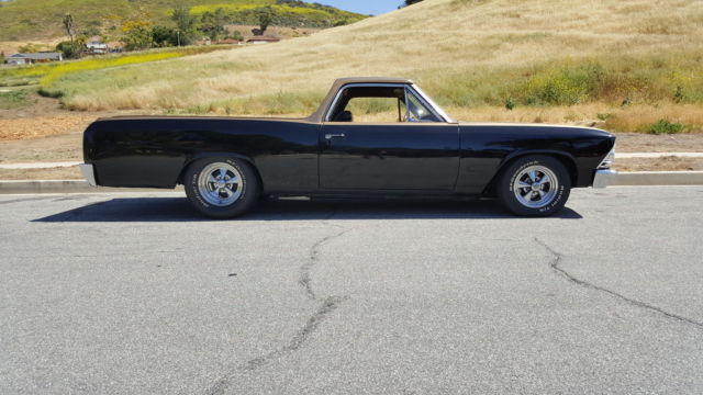 1966 black and gold Chevrolet El Camino