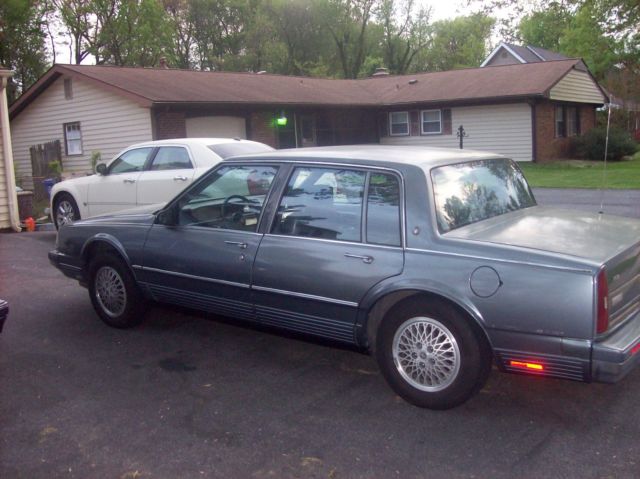 1987 Silver Oldsmobile Ninety-Eight Sedan