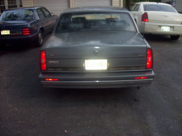 1987 Silver Oldsmobile Ninety-Eight Sedan