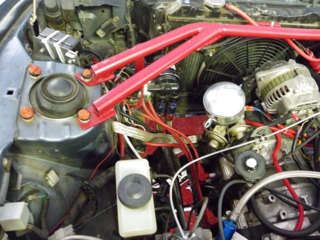 1985 gun metal gray Mazda RX-7 coupe