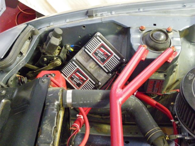 1985 gun metal gray Mazda RX-7 coupe